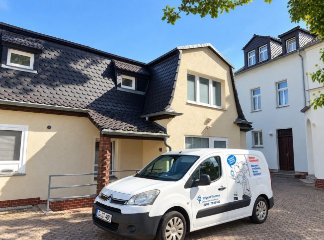 Mehrfamilienhaus in Leipzig mit Naturstein- und Ziegelmauerwerk – Drymat Referenz